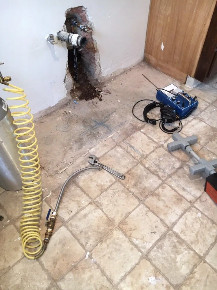 Slab leak detection equipment set up inside a home