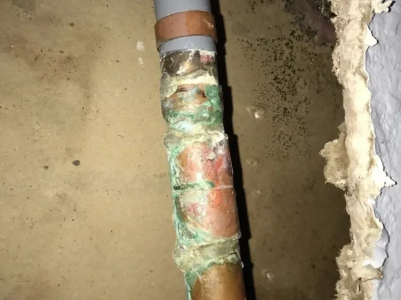 Pipe leak detection being performed on a concealed line